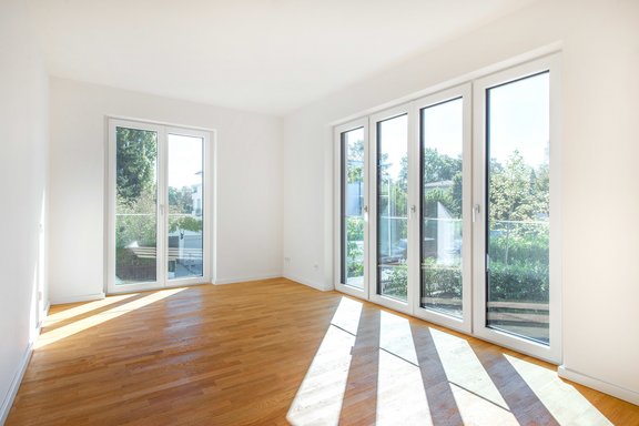 Master bedroom with floor to ceiling windows