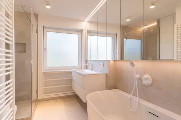 Bathroom with tub and shower