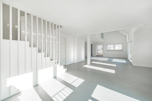 Living area with stairs to the 4th floor