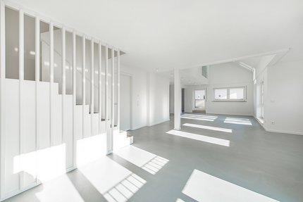 Living area with stairs to the 4th floor