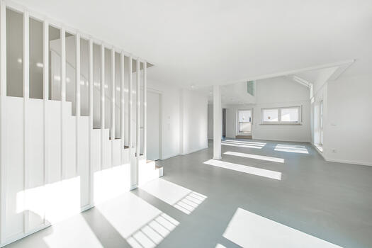 Living area with stairs to the 4th floor
