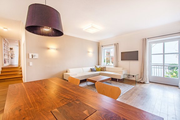 Living area with stairs to the sleeping area