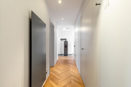 Hallway with custom-made carpentry fixtures