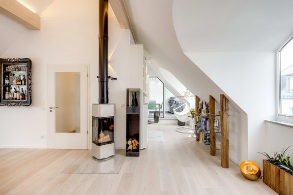Living area with open wood fireplace