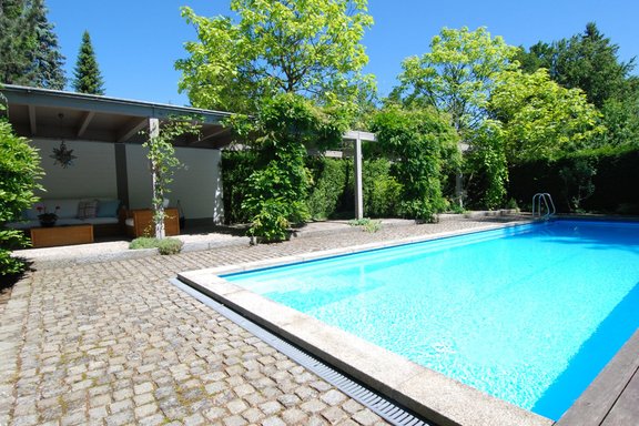 Large pool with outdoor seating