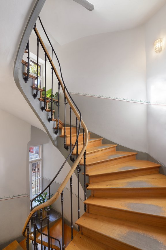 A historical bar railing is supplemented by steps renewed in 1990