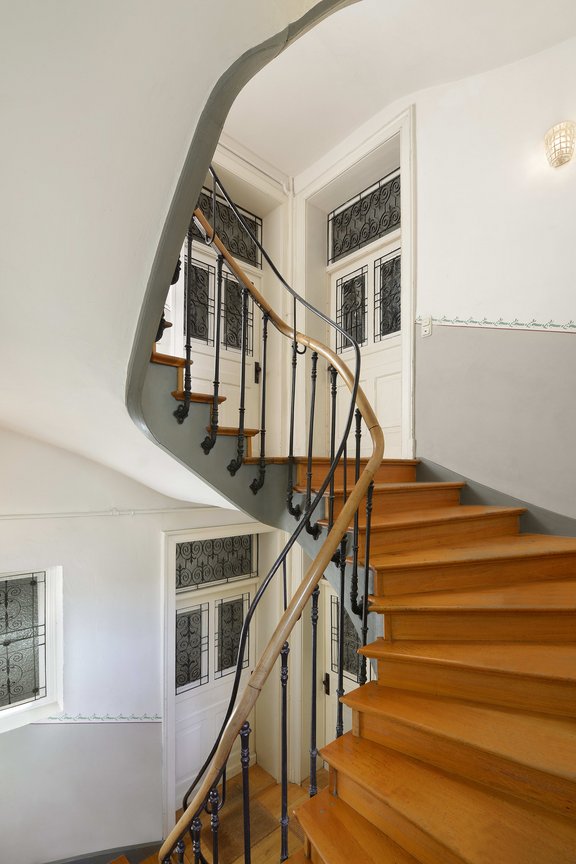 Historic apartment doors create a stately ambience