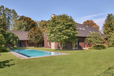 In an unspoiled, idyllic setting: a designer villa with a pool, spa, and guest apartment