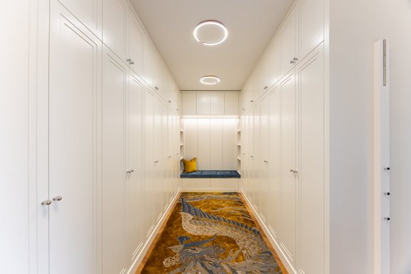 Elegant built-in cabinets in the master closet