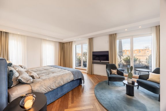 The master suite features an en-suite bathroom and a separate walk-in closet