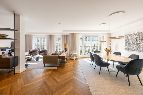 The well-designed floor plan harmoniously combines living and dining spaces