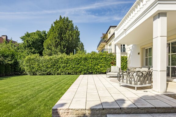 Southwest-facing terrace with a large garden