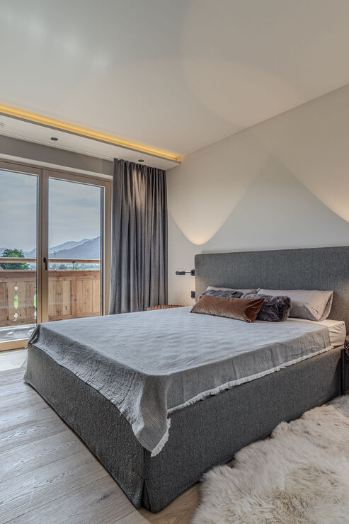 Schlafzimmer mit Balkonzugang