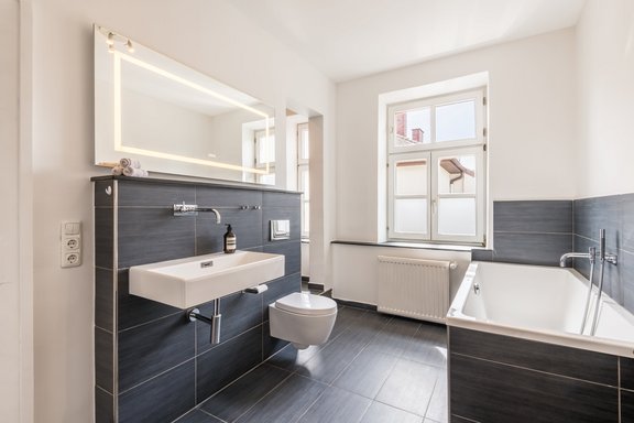 Bathroom with tub and shower