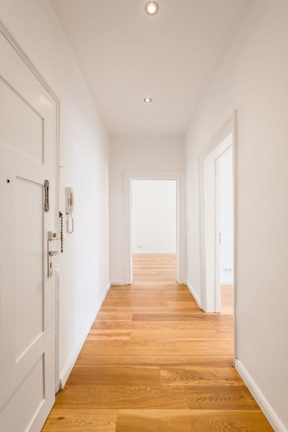 Floor plan of an older building and hardwood floors