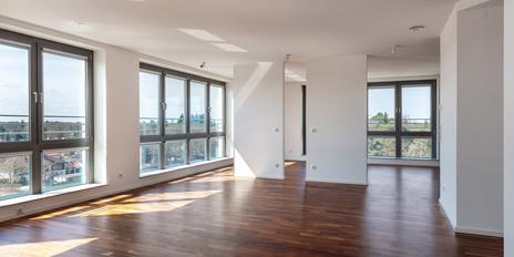 A bright, airy 3-bedroom apartment with penthouse-style charm and views of the Alps