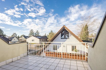 West-facing roof terrace with awning