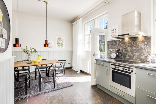 Die Wohnküche verbindet Country und Urban Chic