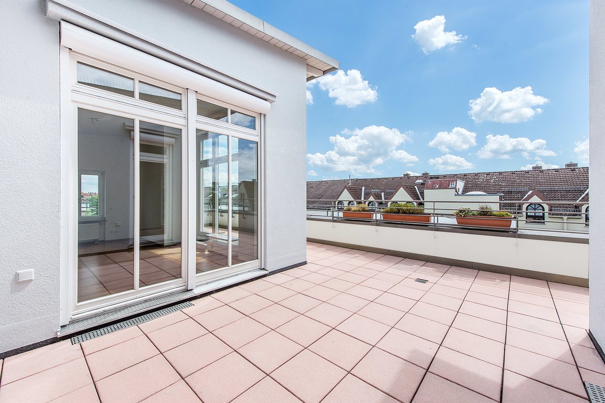 Sunny roof terrace in atrium style