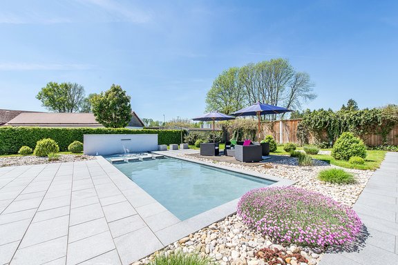 Garden with water basin and terraces