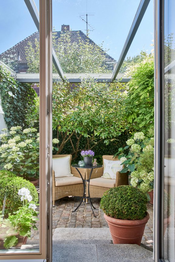 Glasüberdachter Freisitz