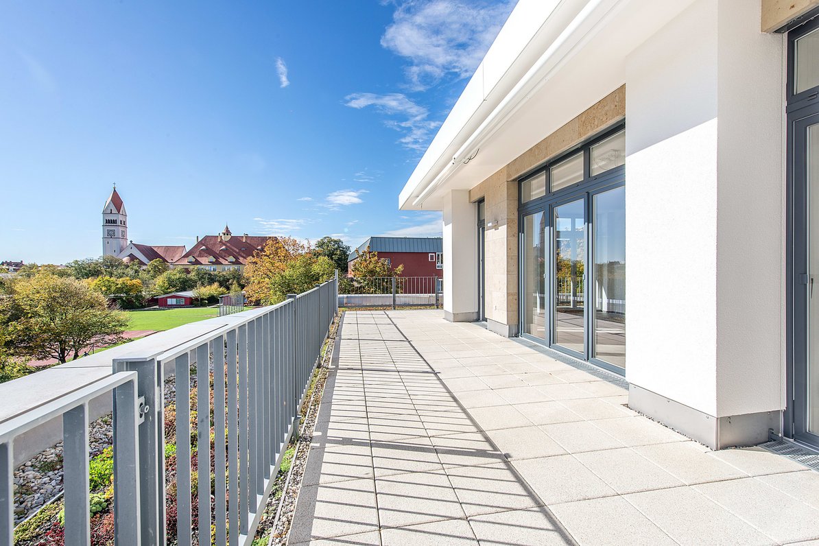 Sunny roof terrace with view to the Alps