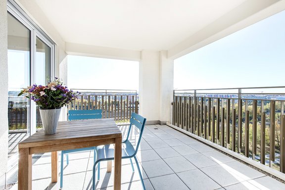 Sunny loggia with alpine view