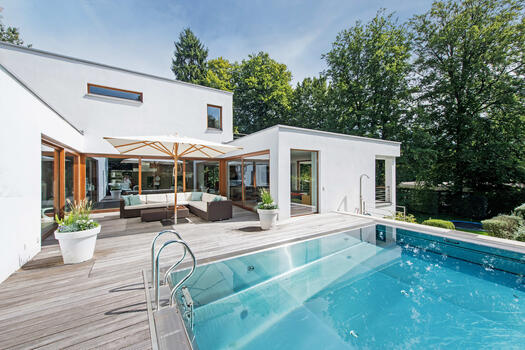 Exterior view with atrium and pool