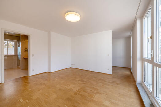 Bright master bedroom with a walk-in closet and an en suite bathroom