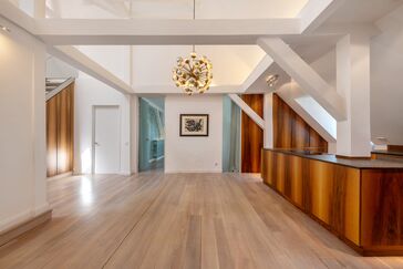 Watch video: A Light-Filled Home in a Prime Location: Penthouse Apartment with a Corner Tower in a Palace Built in 1899