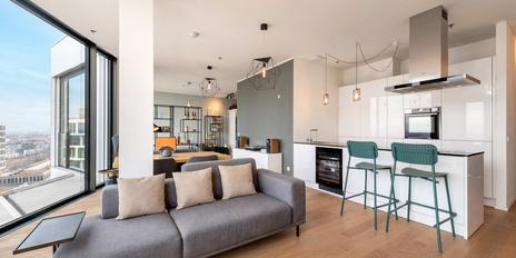 Living at the top: Modern city residence on the 14th floor with concierge and rooftop access