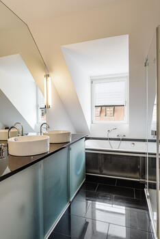 Bathroom with tub and shower