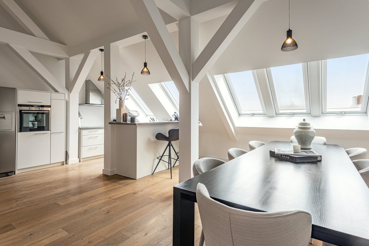Dining room with view into the kitchen