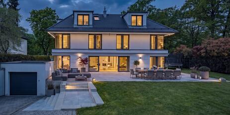 Luxurious family home with an elevator, underground parking, a fitness area, and a heat pump