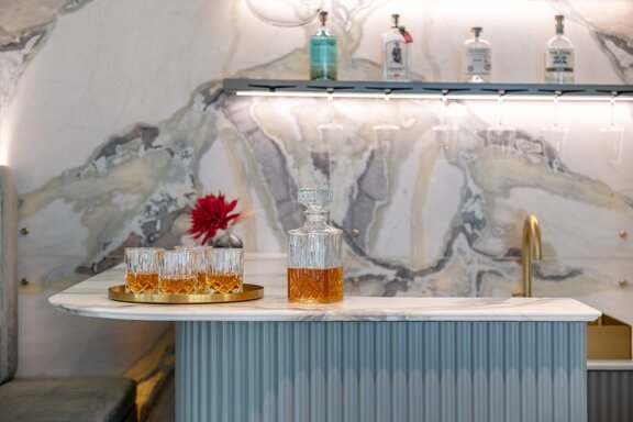 Bar with an onyx wall in the dining room