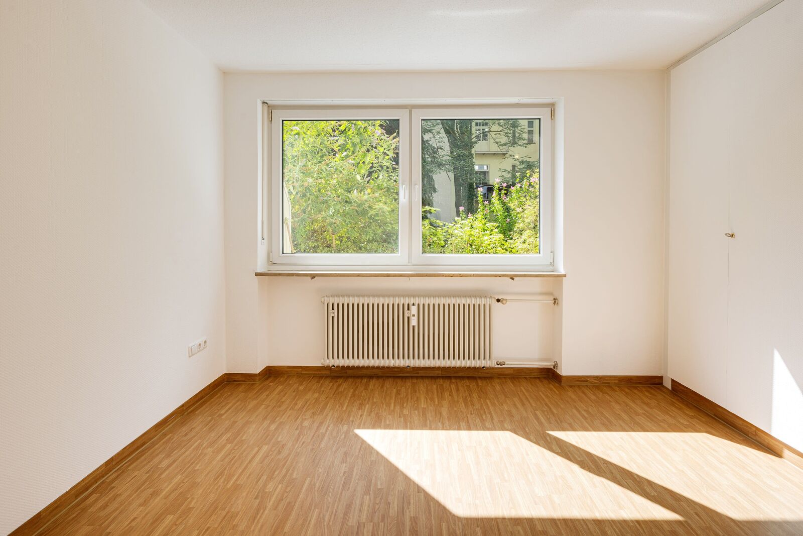 Schlafzimmer mit Gartenblick
