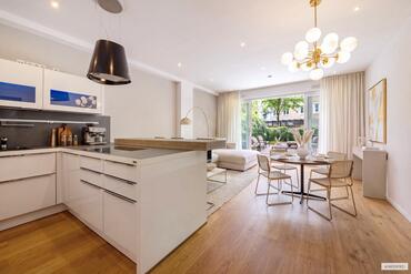Modern 2-room garden apartment with a sunroom and 2.80-meter-high ceilings