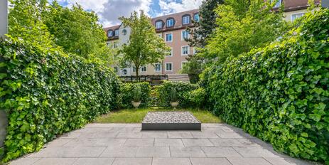 Moderne 2-Zimmer-Gartenwohnung mit Wintergarten und Deckenhöhen von 2,80m