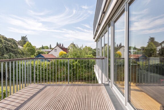 South balcony with a view of the greenery