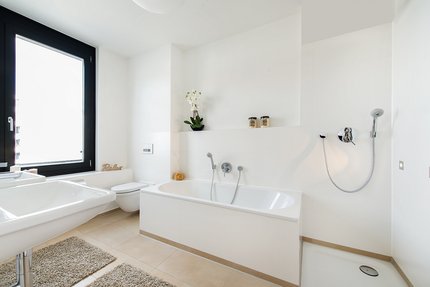 Puristically designed master bathroom