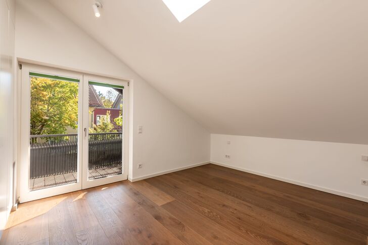 Schlafzimmer mit Balkonzugang