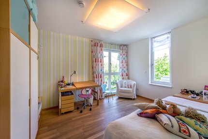 Three rooms with floor to ceiling windows on the upper floor