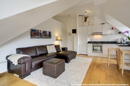 Living room with open kitchen