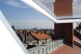 Modern bright three-room roof terrace apartment with gallery in art nouveau building