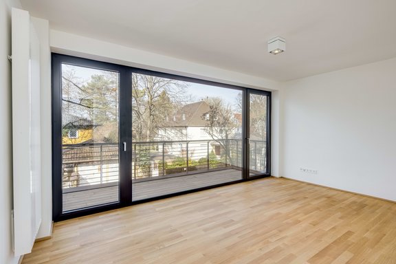 Schlafzimmer mit Balkonzugang