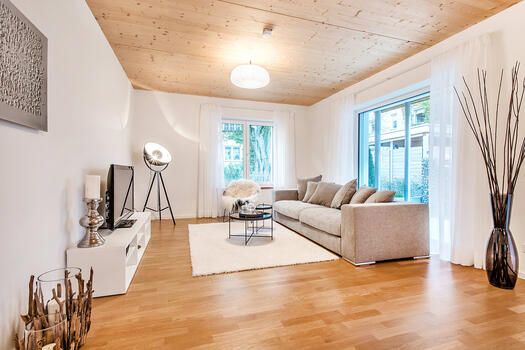 Bright living room with terrace access