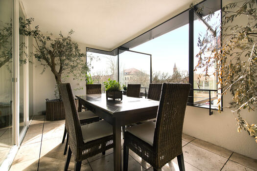 Southwest loggia with pivoting windows