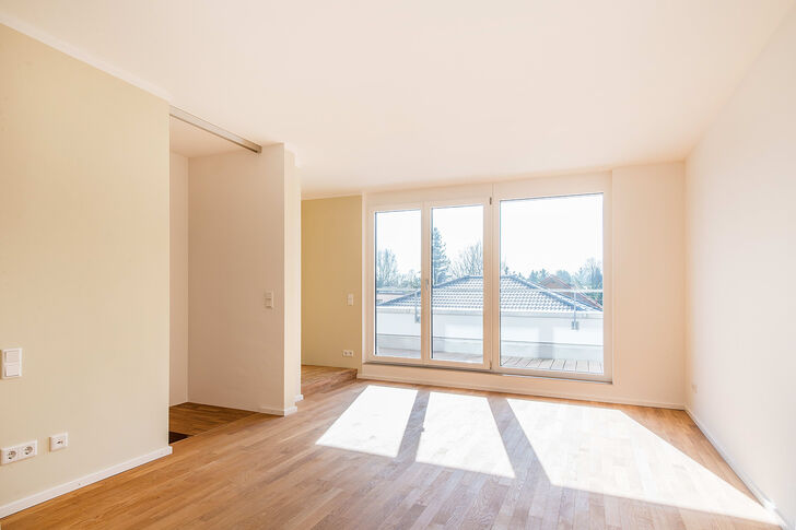 Schlafzimmer mit Zugang zur Dachterrasse