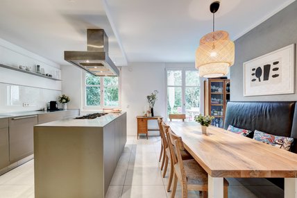 Fitted kitchen with dining area