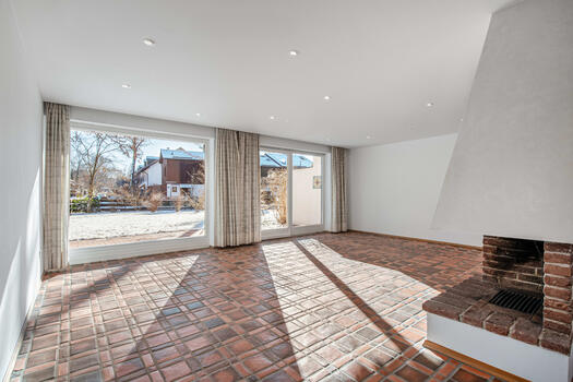 Living area with open fireplace